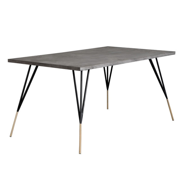 Table de salle à manger Matador, table rectangulaire mettant en contraste le plateau de béton et les pattes en acier noir et laiton antique pour un design urbain et aéré par Maillé Style (Érik Maillé)