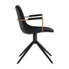 Chaise de salle à manger pivotante Carole avec un siège en tissu noir à l'intérieur et similicuir noir capitonné en rainure à l'extérieur. Élégante, contemporain et urbain avec ses bras dorés et son pied en métal noir par Maillé Style (Érik Maillé)