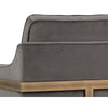 La chaise grise Céline est un fauteuil d'appoint en tissu doux gris avec une structure visible bronze rustique pour un design contemporain et confortable par Maillé Style (Érik Maillé)