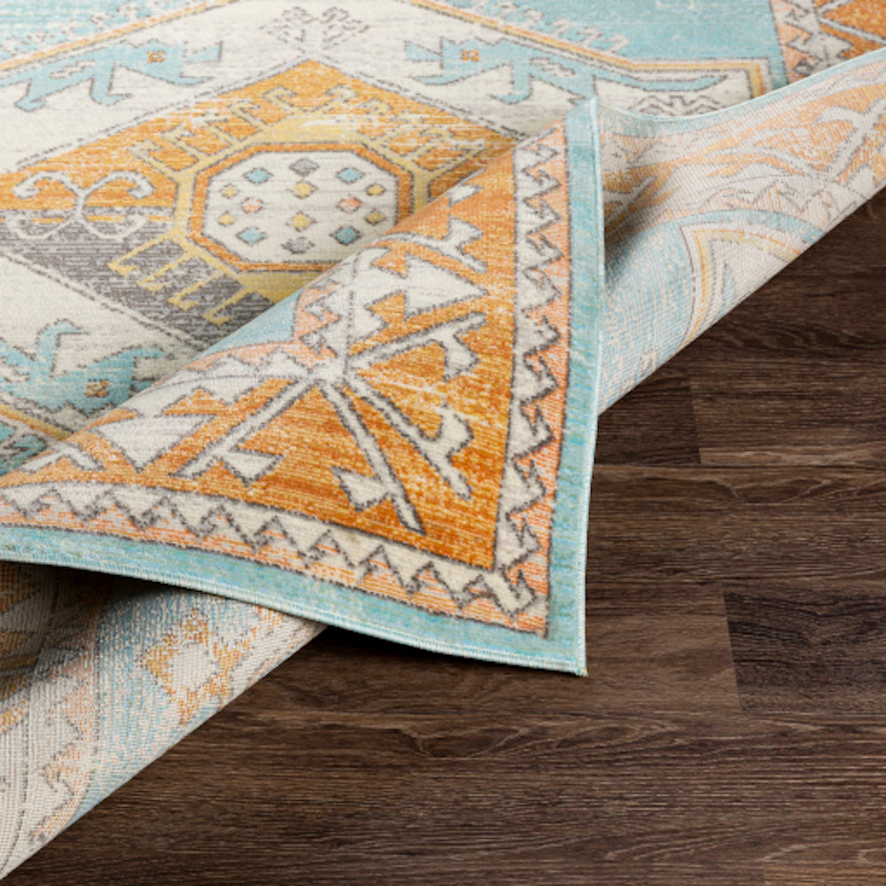 carpette turquoise orange motif creme bleu