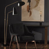 La lampe de table EWEN mélange les matériaux avec sa base de marbre noir et son corps en laiton pour un résultat moderne par Maillé Style (Érik Maillé)