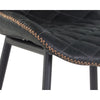 Tabouret de comptoir Lilas, tabouret avec une assise en cuir noir capitonné en losange et surpiqures apparentes en zigzag pour un design élégant par Maillé Style (Érik Maillé)