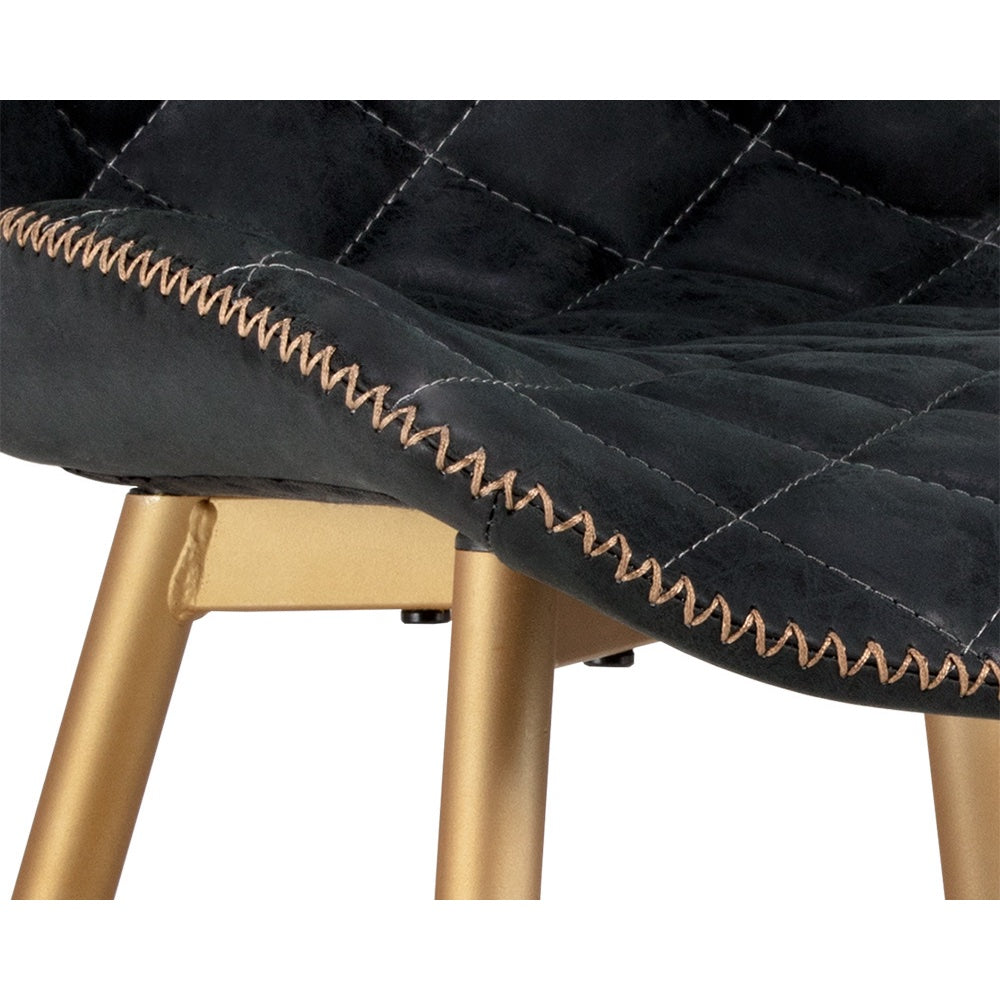 Chaise de salle à manger LYLA en similicuir noir capitonné en diamant avec coutures en zigzag et pieds or champagne par Maillé Style (Érik Maillé)