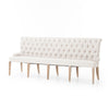 Sofa Lyne, canapé en tissu blanc soutenu par des pieds en bois naturel dont le design est frappant avec son capitonnage profond et son style à la fois traditionnel et contemporain par Maillé Style (Érik Maillé)
