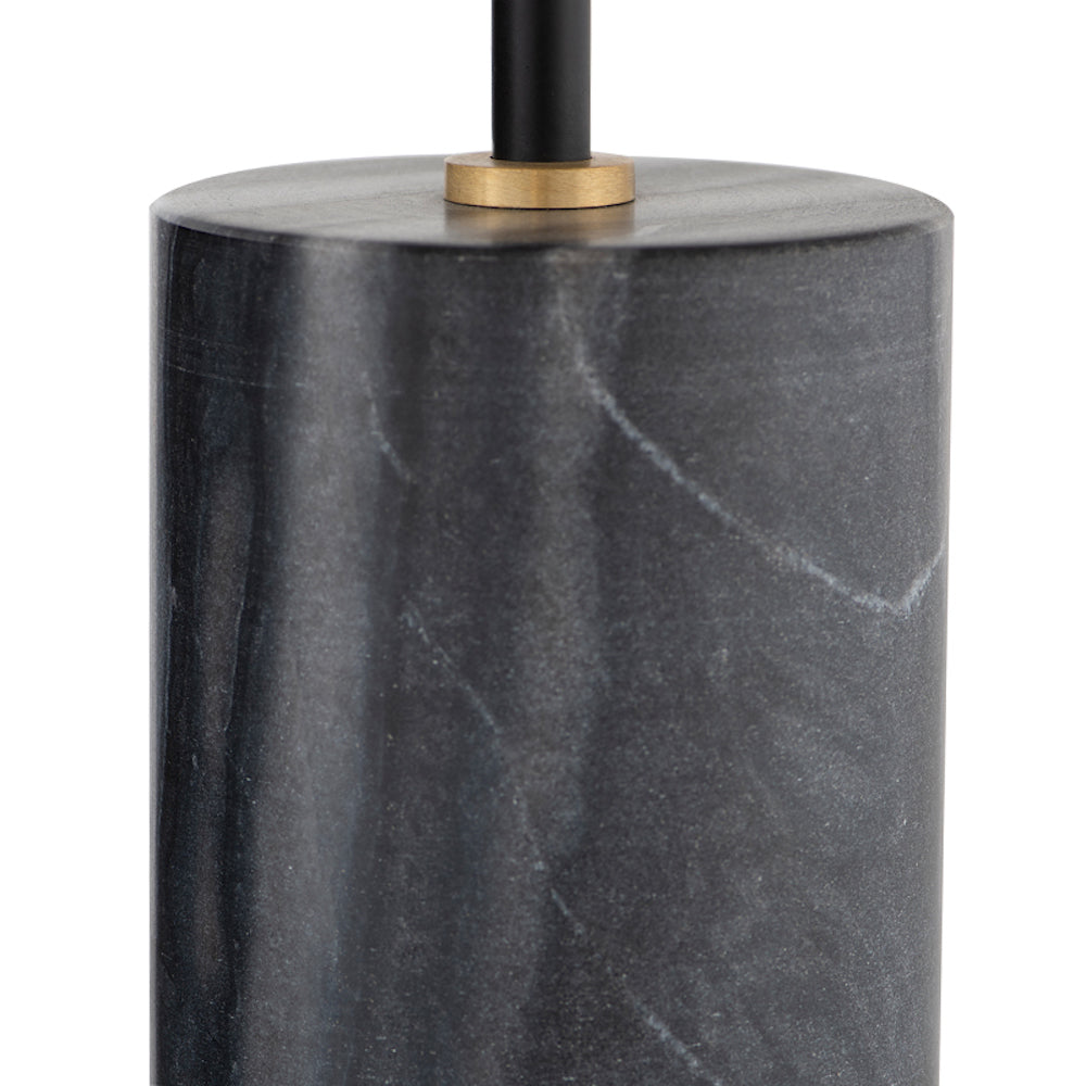 La lampe sur table MADDOX est surprenant avec son abat-jour décalé en laiton sur une base de marbre noir par Maillé Style (Érik Maillé) 