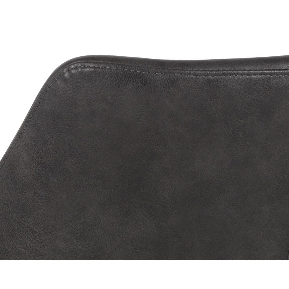 Chaise de salle à manger Matisse, chaise avec accoudoirs au design sculpté, urbain et confortable en similicuir gris foncé et aux pieds en acier noir par Maillé Style (Érik Maillé)