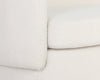 Sofa Valencia, canapé en tissu bouclé blanc tout en courbes pour un design accrocheur et contemporain par Maillé Style (Érik Maillé)