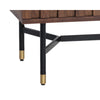 La table de chevet Wilson est une table vintage et chic grâce avec ses tiroirs aux façades crénelées, son dessus de marbre noir et ses touches dorées par Maillé Style (Érik Maillé)