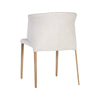 Chaise de salle à manger ZAYDA, chaise élégante et moderne avec son tissu blanc cassé, son capitonnage vertical et ses pieds dorés par Maillé Style (Érik Maillé)